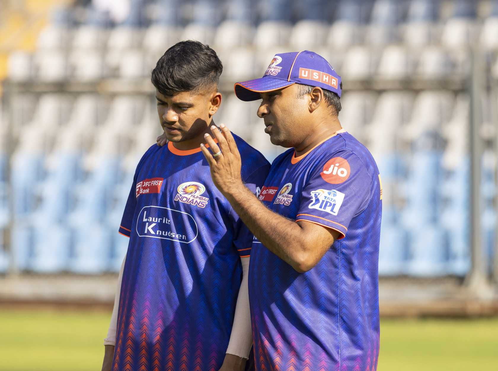 Ashwani Kumar with Head Coach Mahela Jayawardene at a practice session