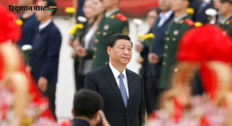 Chinese leader at a formal event with military personnel.