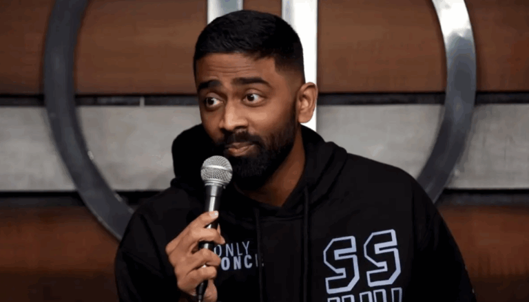 Pranit More speaking at a comedy event.